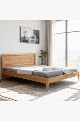 Manželská postel na nohou z dubu model Praha