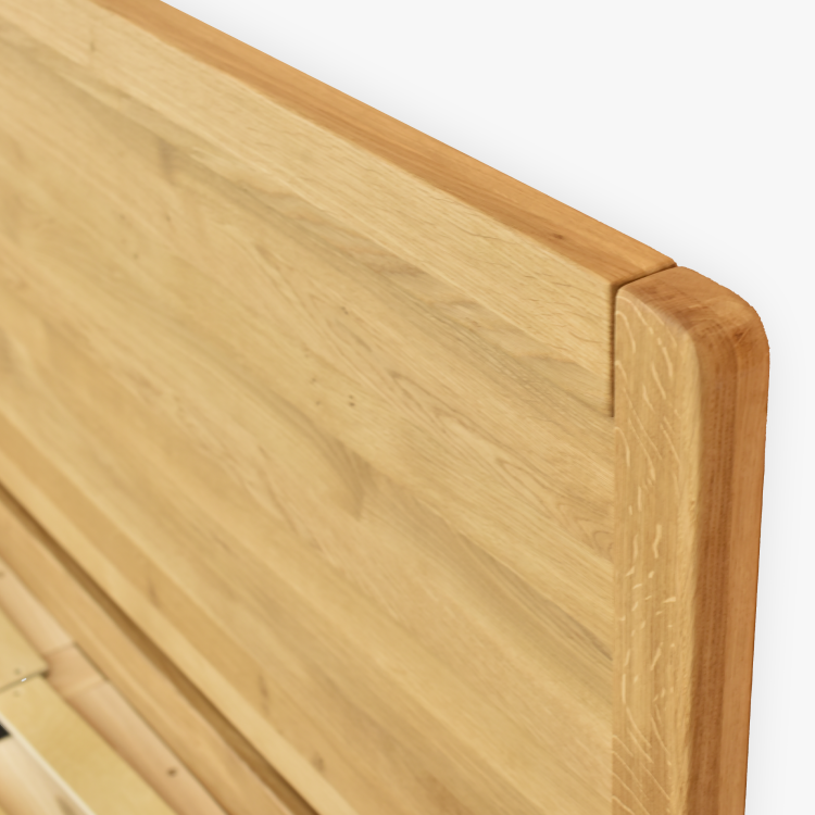 Manželská postel na nohou z dubu model Praha