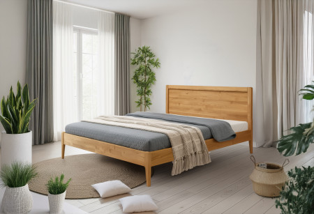 Manželská postel na nohou z dubu model Praha