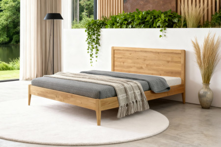 Manželská postel na nohou z dubu model Praha