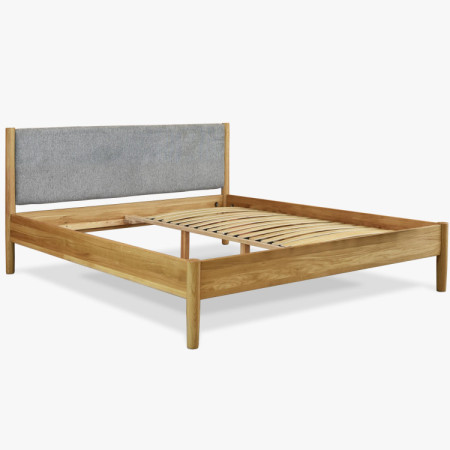 Bett aus massivem Eichenholz mit Stoffkopfteil 180 x 200 cm