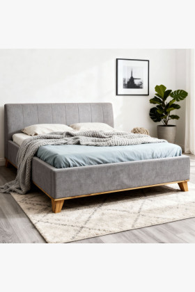 Manchettbett auf Füßen mit Stauraum 180 x 200 cm