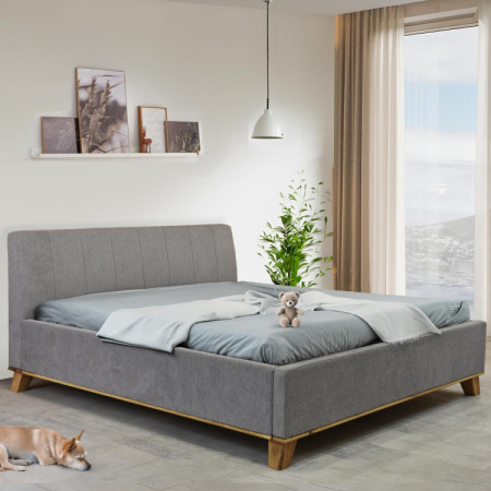 Manchettbett auf Füßen mit Stauraum 180 x 200 cm