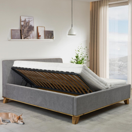 Manchettbett auf Füßen mit Stauraum 180 x 200 cm