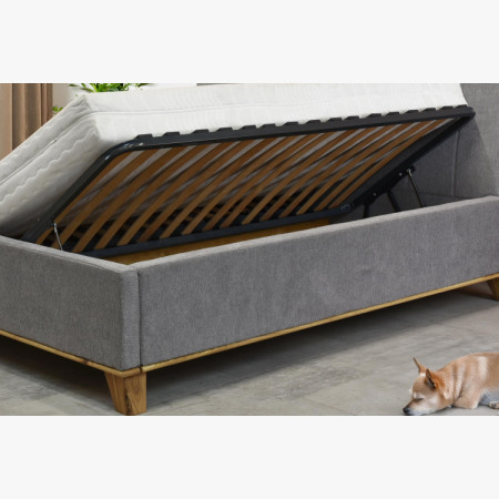 Manchettbett auf Füßen mit Stauraum 180 x 200 cm