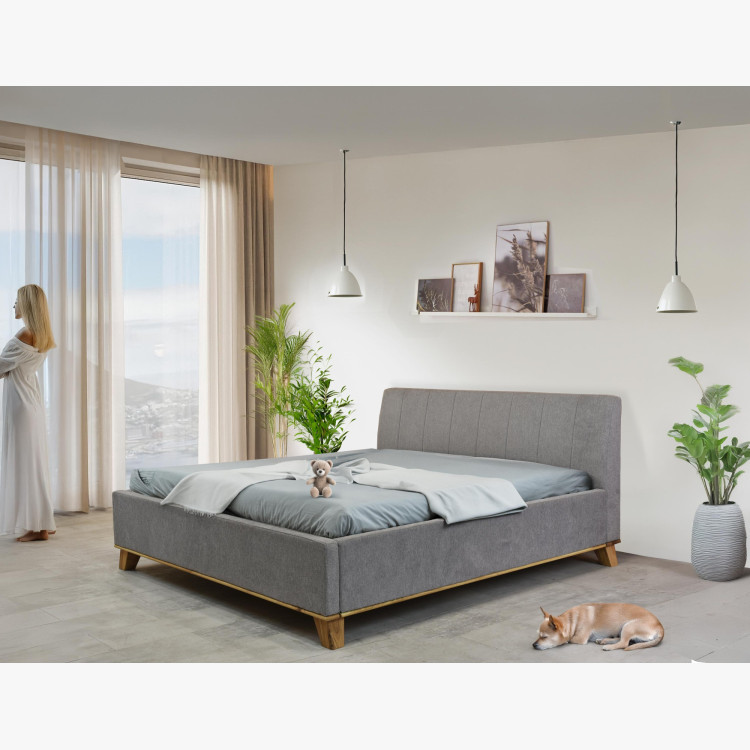 Manchettbett auf Füßen mit Stauraum 180 x 200 cm