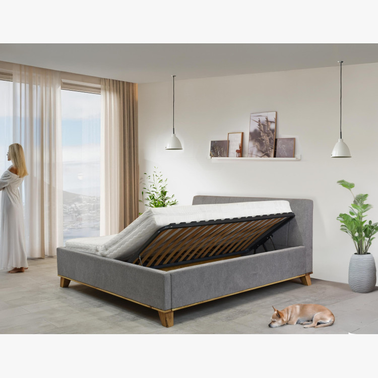 Manchettbett auf Füßen mit Stauraum 180 x 200 cm