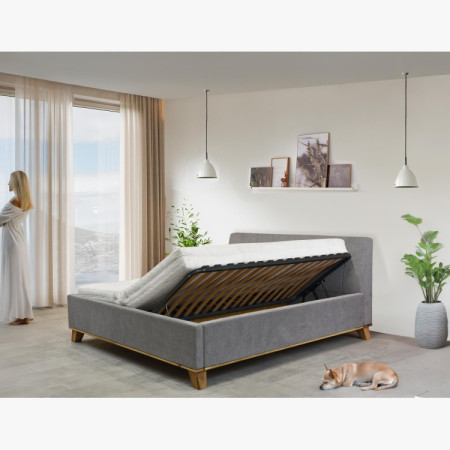 Manchettbett auf Füßen mit Stauraum 180 x 200 cm