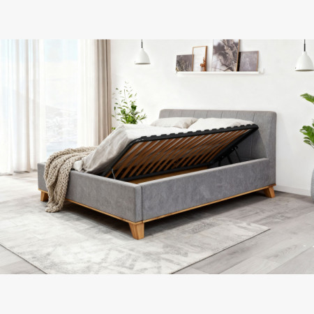 Manchettbett auf Füßen mit Stauraum 180 x 200 cm