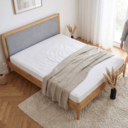 Manchette Bett mit Füßen aus Eiche 180 x 200 cm, Stoffkopfteil