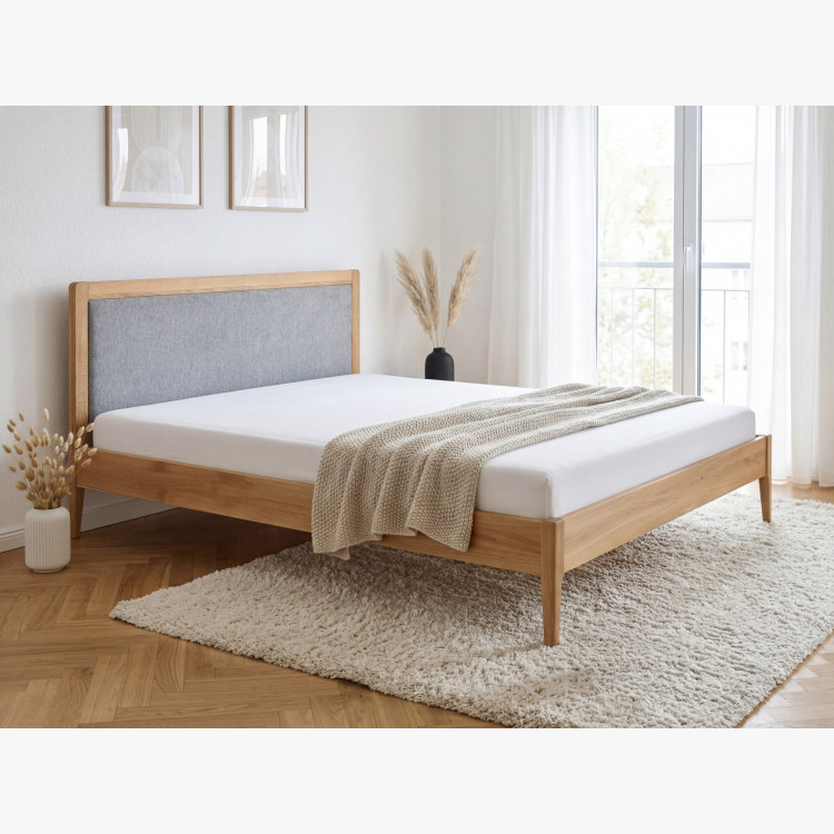 Manchette Bett mit Füßen aus Eiche 180 x 200 cm, Stoffkopfteil