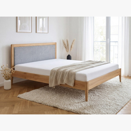 Manchette Bett mit Füßen aus Eiche 180 x 200 cm, Stoffkopfteil